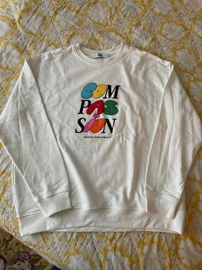 Cream Graphic Crewneck Sweater